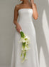 Ivory Falls cascading white calla lily bridal bouquet styled with a modern strapless wedding dress