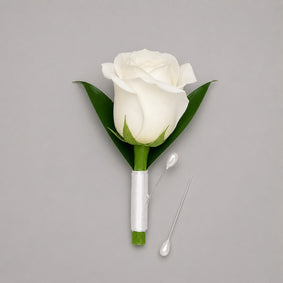 Vow white rose boutonniere with white satin ribbon and pearl pins