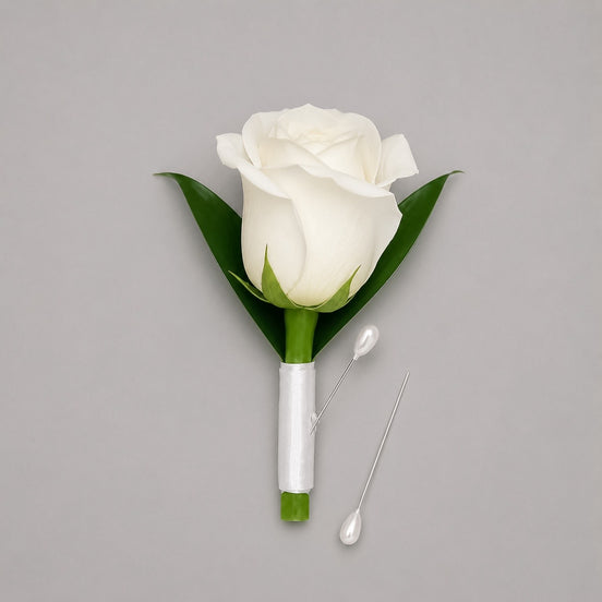 Vow white rose boutonniere with white satin ribbon and pearl pins